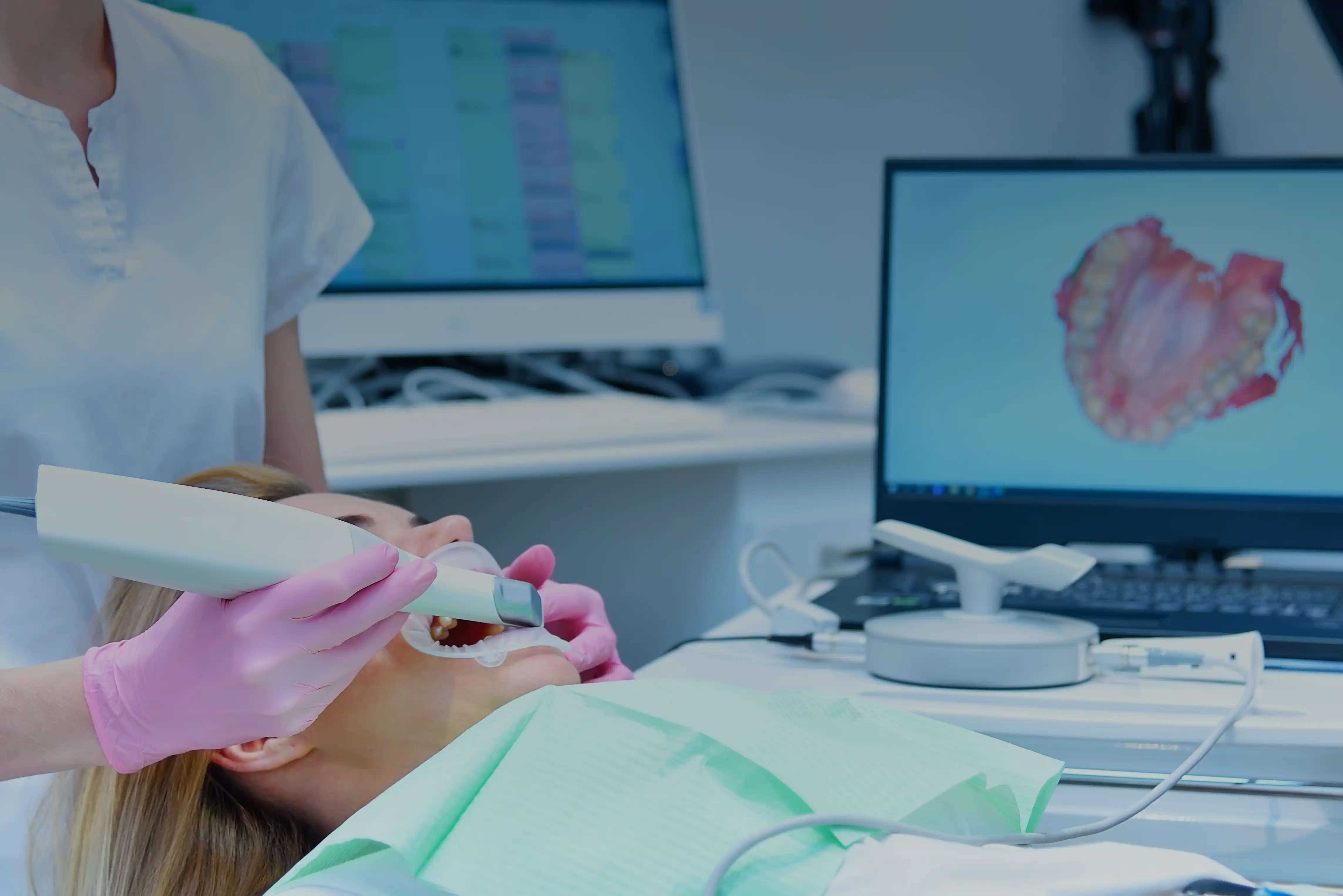 Our patient undergoes intraoral scanning